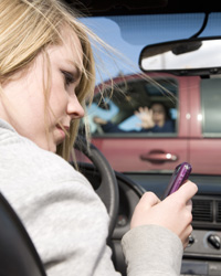 Girl texting and driving